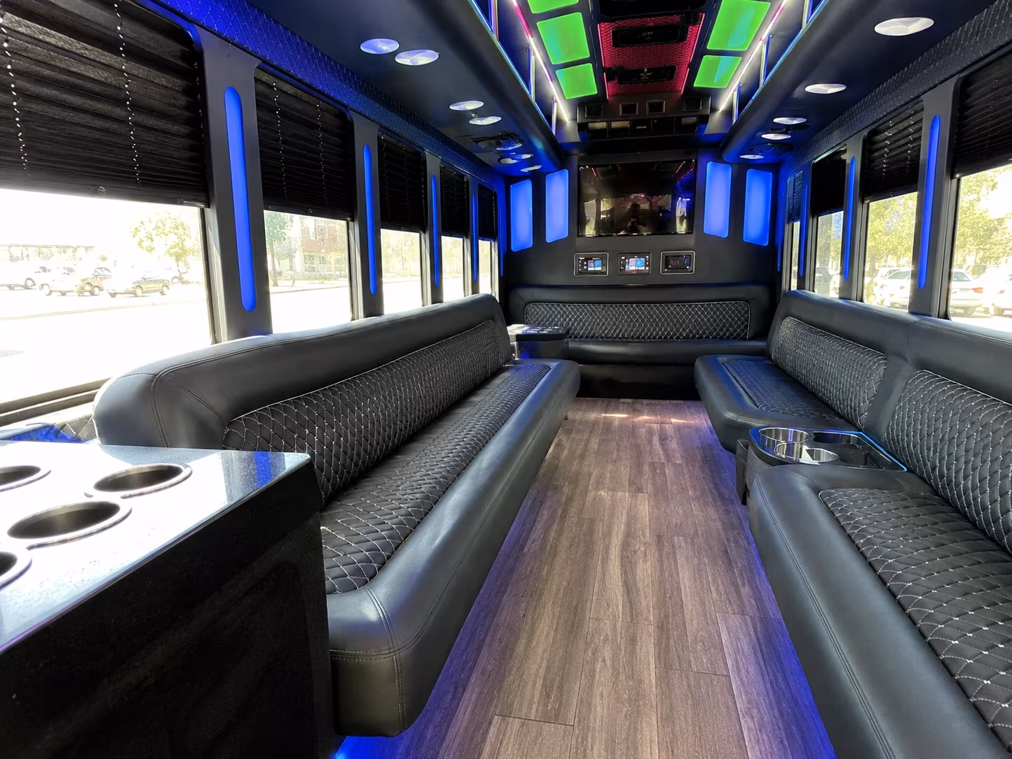 Wedding guests seated inside a party bus serving Miami Gardens